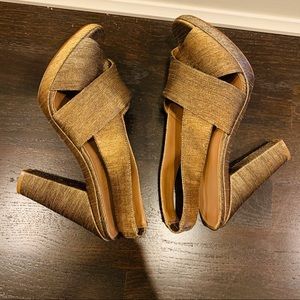 High heeled gold and bronze shoes by Dani Black